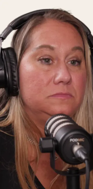 Sarah listening at her microphone